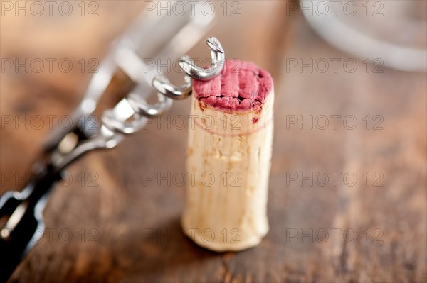 Red wine corking and tasting closeup macro