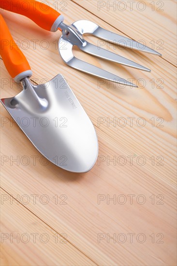 Agricultural tools Spade and fork on wooden boards