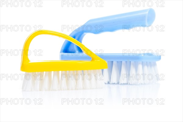 Blue and yellow scrubbing brushes