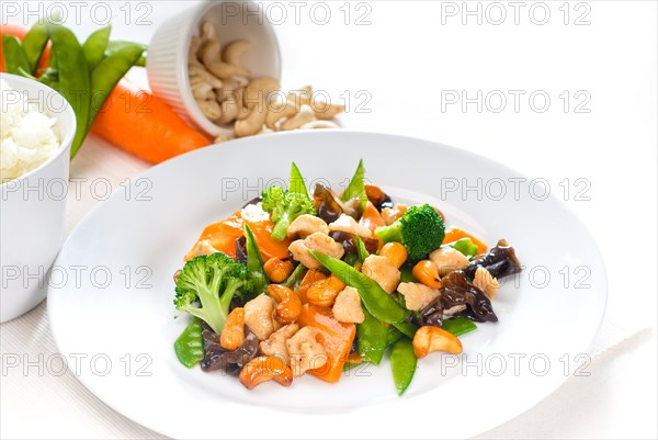 Fresh chicken and vegetables stir fried with cashew nuts