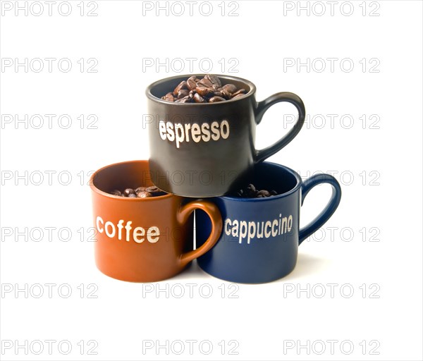 Coffee espresso cappuccino cups with coffee beans isolated on white background