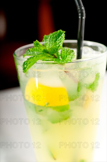 Mojito caipirina cocktail with fresh mint leaves