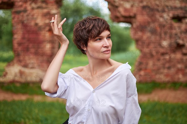 Image of a stylish beautiful woman in a shirt