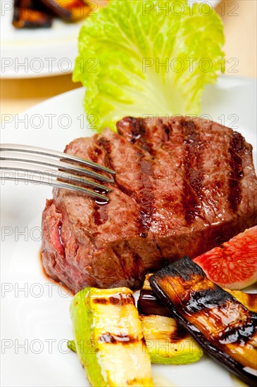 Grilled fresh beef filet mignon and vegetables