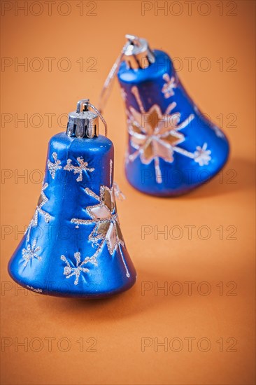 Blue Christmas toys on a brown background