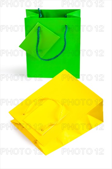 Two paper bags in front of a white background