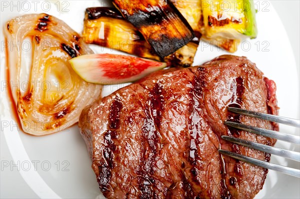 Grilled fresh beef filet mignon and vegetables