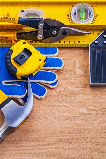 Brown wooden board with collection of building objects Maintenance concept