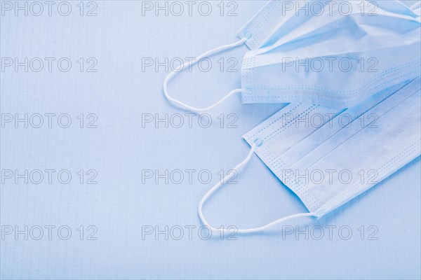 Copyspace image disposable face masks on blue background