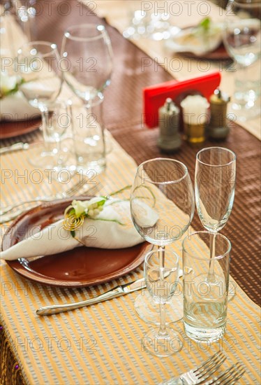 Empty kitchen glasses on the dining table