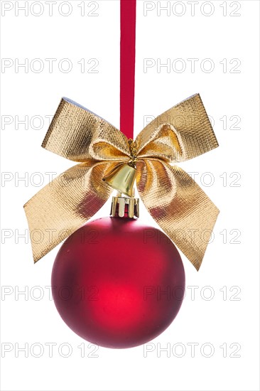 Hanging red Christmas tree bauble with gold-coloured bow and small bell insulated
