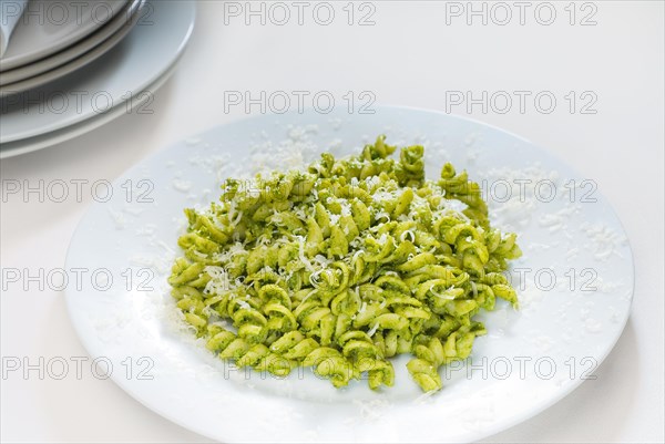 Italian fusilli pasta and fresh homemade pesto sauce