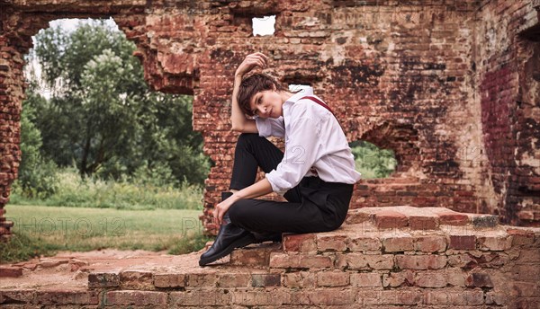 Image of a stylish beautiful woman in a white shirt