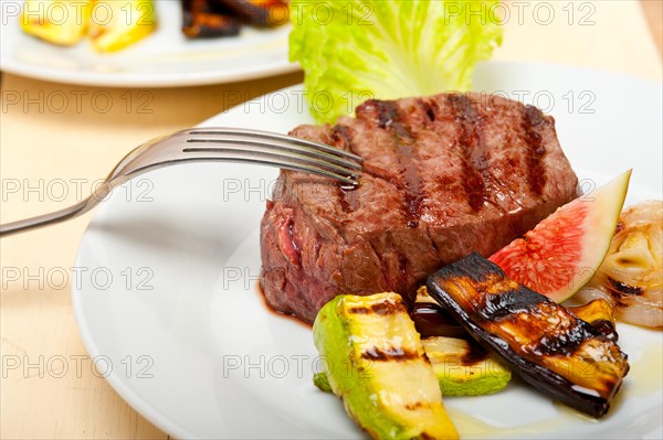 Grilled fresh beef filet mignon and vegetables