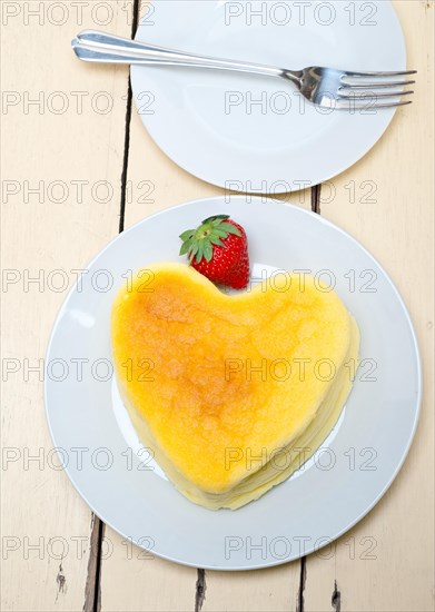 Heart shaped cheesecake with strawberryes ideal cake for valentine day