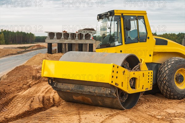 Sand compactor on sand pile