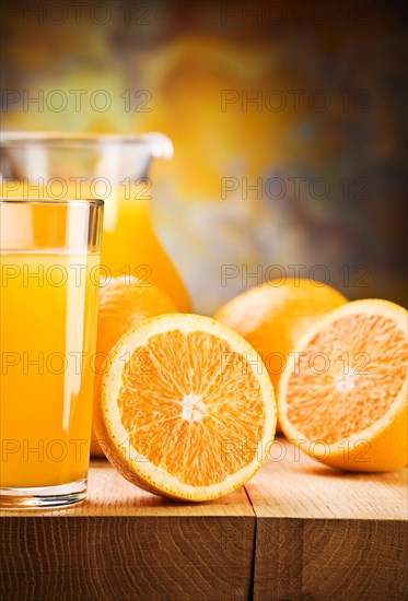 Cut the oranges and pour the juice into a glass