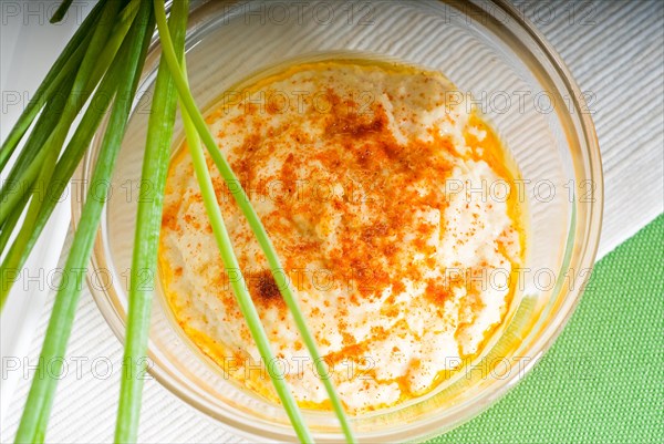 Fresh healthy hummus with chives typical middle east dish