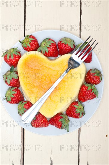 Heart shaped cheesecake with strawberryes ideal cake for valentine day