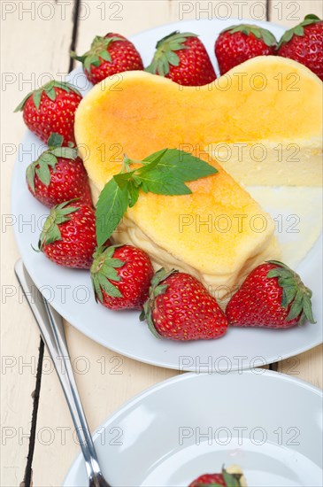 Heart shaped cheesecake with strawberryes ideal cake for valentine day