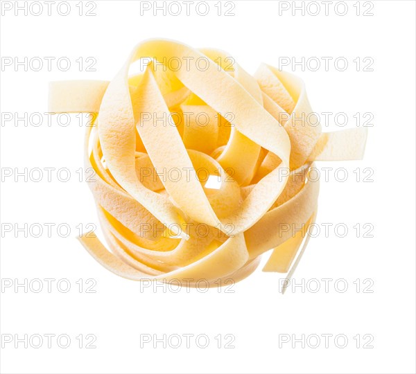 Raw pasta isolated on white