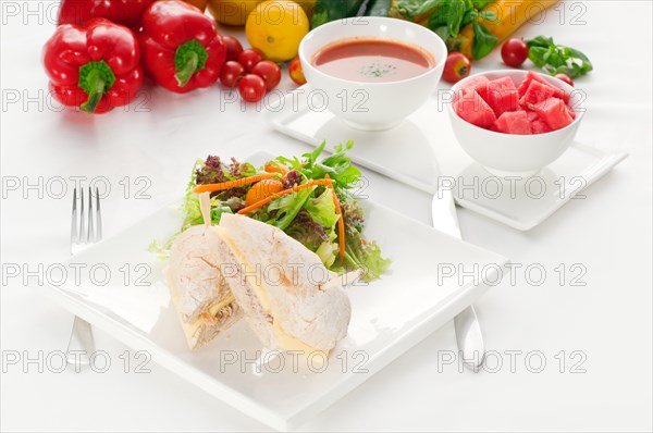 Tuna fish and cheese sandwich with fresh mixed salad