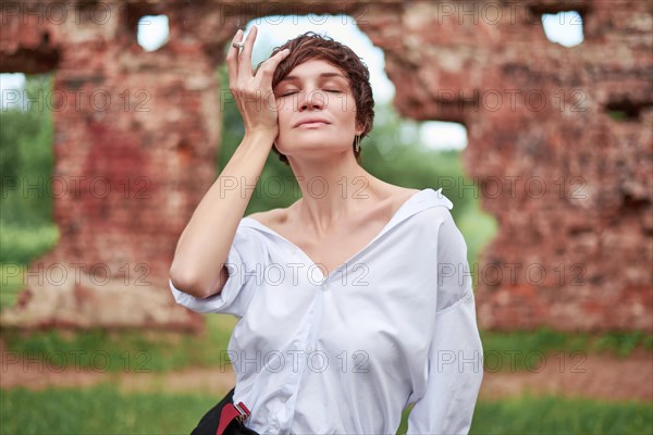 Image of a stylish beautiful woman in a shirt