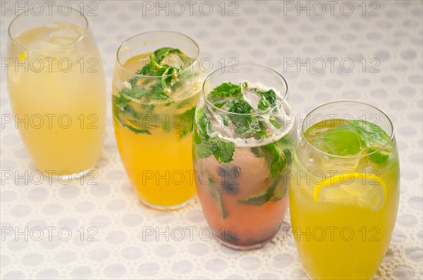 Selection of fresh fruits colorful long drink cocktails