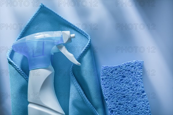 Blue washing rag sprayer sponge on white background