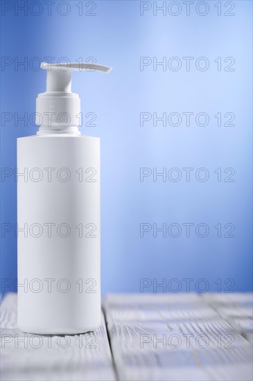 Single white skin care sprayer on the table