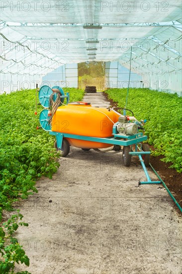 Large pesticide sprayer in the greenhouse