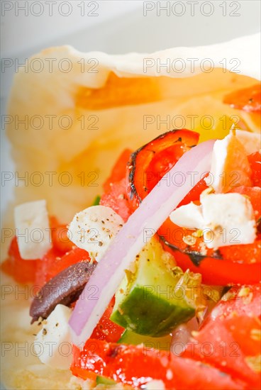 Fresh homemade salad wrap on pita bread