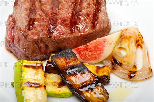 Grilled fresh beef filet mignon and vegetables