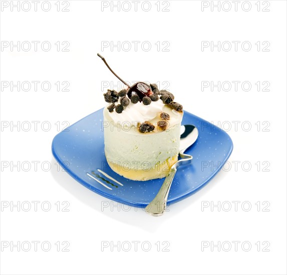 Piece of fresh fruit cake on white background