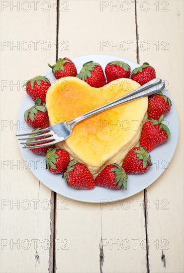 Heart shaped cheesecake with strawberryes ideal cake for valentine day