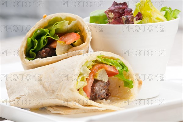 Kafta shawarma chicken pita wrap roll sandwich traditional arab mid east food