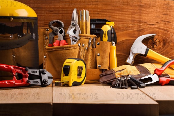 Set of tools on wooden boards