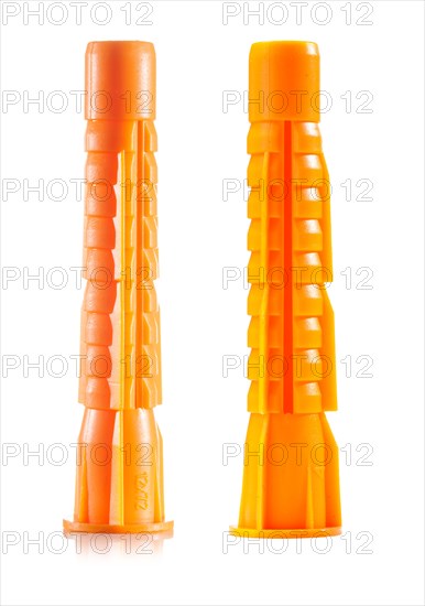 New orange-coloured plastic dowels against a white background