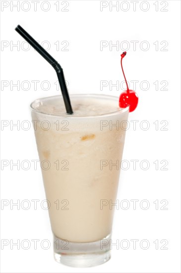 Frozen banana daiquiri drink cocktail with red cherry and black straw isolated on white background