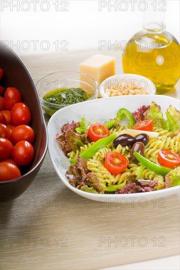 Fresh healthy homemade italian fusilli pasta salad with parmesan cheese