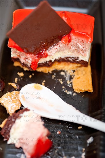 Fresh strawberry yogurt mousse with macaroon and blueberry on top