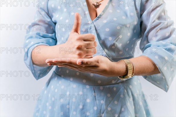 Hands of person gesturing help in sign language. Help gesture with hands in sign language