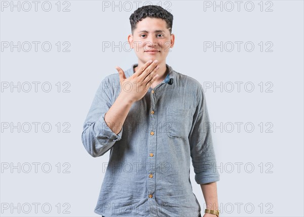 Man making THANK YOU gesture in sign language isolated. People showing THANK YOU gesture in sign language. Non-verbal communication concept