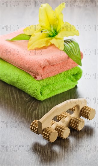 Flower on towels with massager