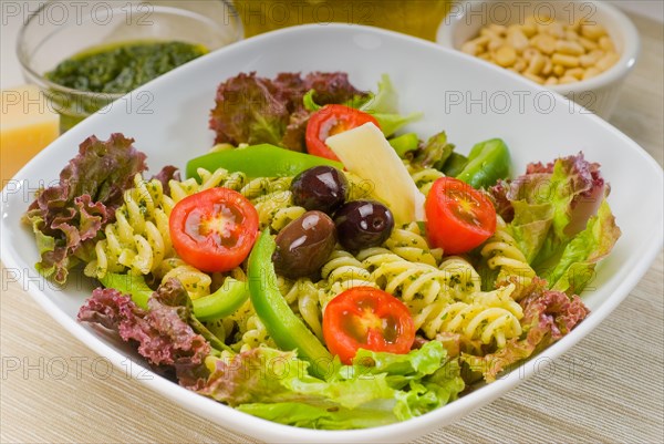 Fresh healthy homemade italian fusilli pasta salad with parmesan cheese