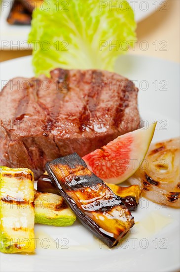 Grilled fresh beef filet mignon and vegetables