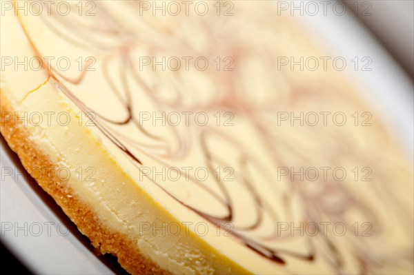 Fresh baked classic Cheese cake with chocolate topping