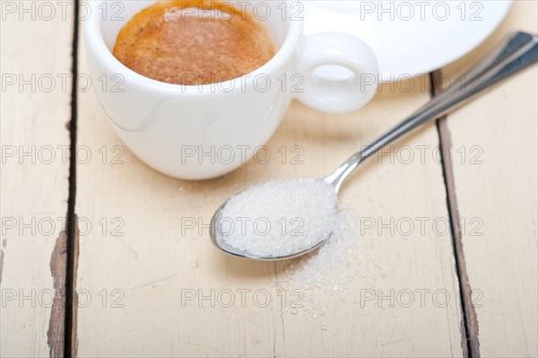 Italian espresso coffee over white wood table