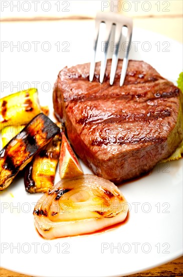 Grilled fresh beef filet mignon and vegetables