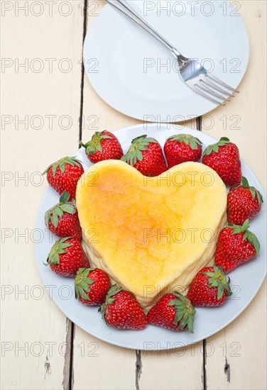 Heart shaped cheesecake with strawberryes ideal cake for valentine day